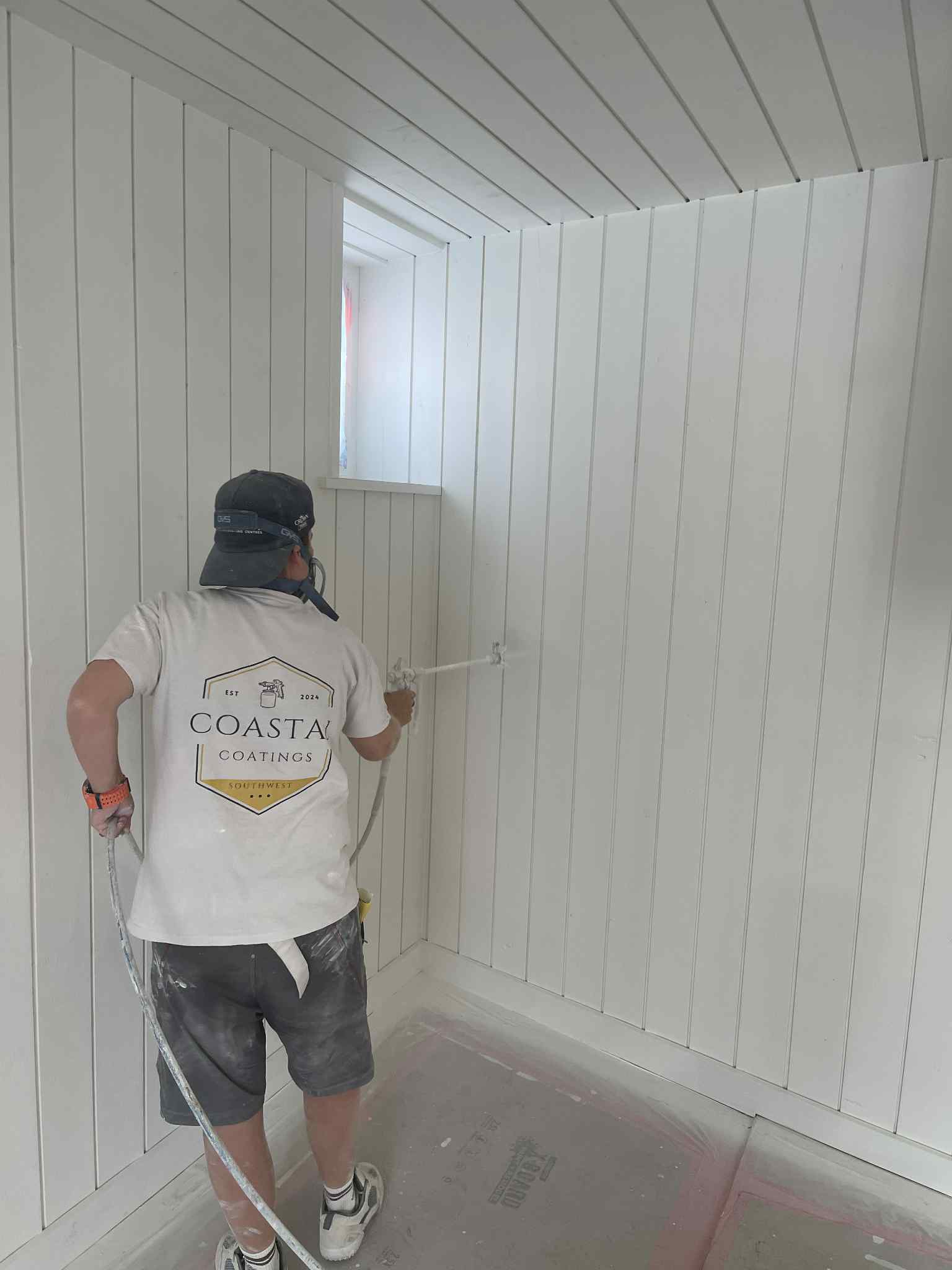 Spray finish decorating to internal wood panelling